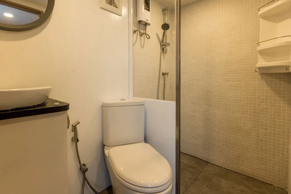 En-suite bathroom with hot shower in a Blue Dolphin cabin