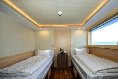 Twin Sea View — two beds and a full-width window
