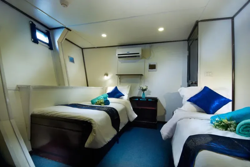 Classic Twin cabin on the lower deck of Galapagos Master with two separate beds