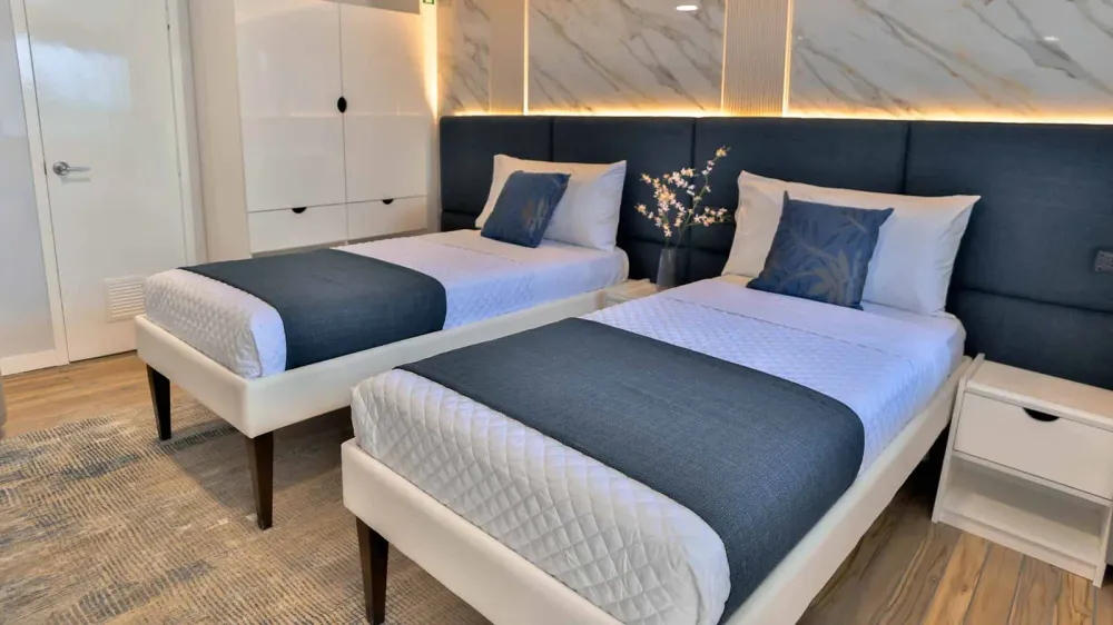Galaxy Diver II upper deck cabin — two single beds and a wardrobe