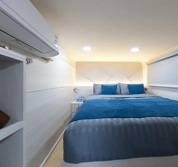 Cabin A2 on the Krishna 3 upper deck with a wardrobe and air conditioner