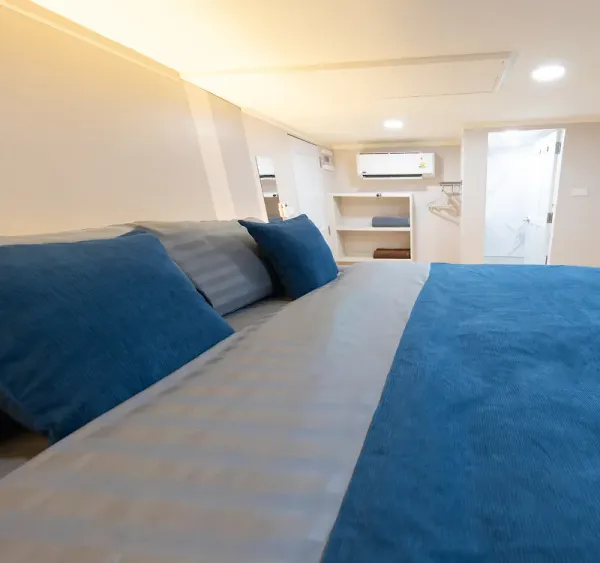 Krishna 3 master cabin looking towards the bathroom and air conditioner