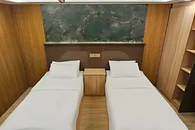Каюта Premium Twin/Double на Maldives Master — две односпальные кровати