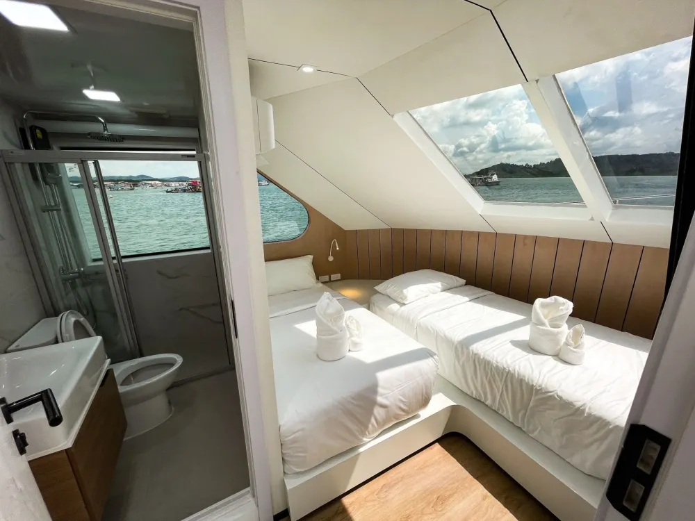 Forward twin cabin on Mandarin Queen 9 with its own bathroom