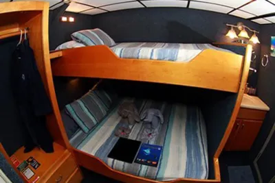Double Stateroom on Palau Aggressor II — bunk-style layout on the dive deck
