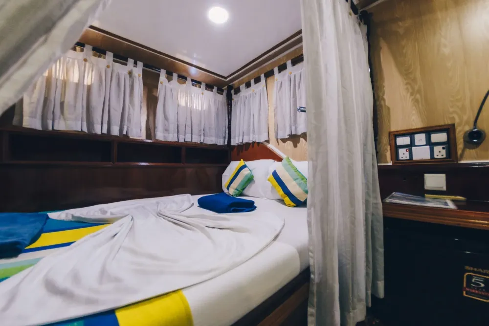 Upper deck ocean view cabin on Princess Dhonkamana — view from the bed towards the windows
