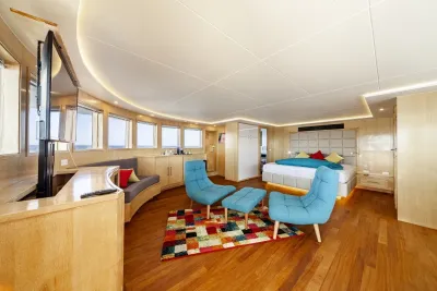 Royal Suite sitting area with armchairs by the panoramic windows