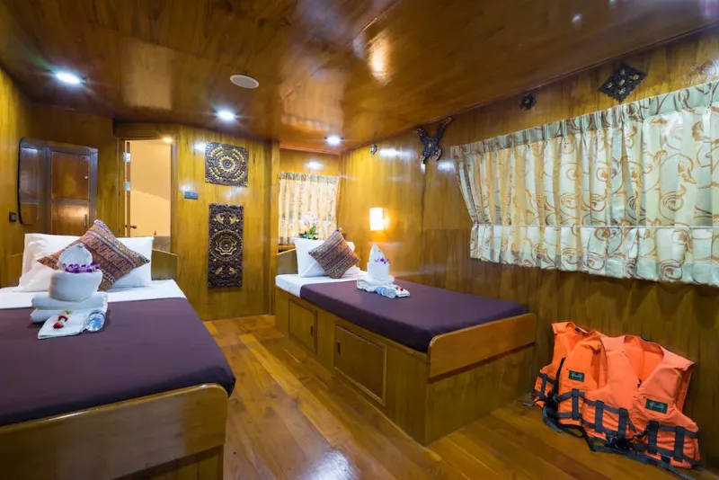 Master cabin set up with two separate beds