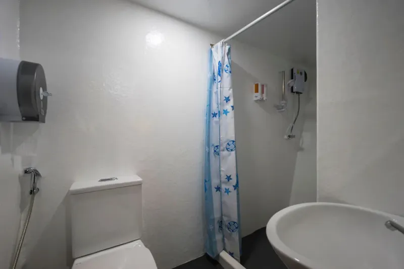 Standard cabin en-suite bathroom with hot shower