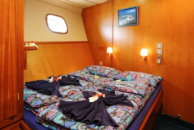 Sea Bird double cabin — double bed beneath the porthole