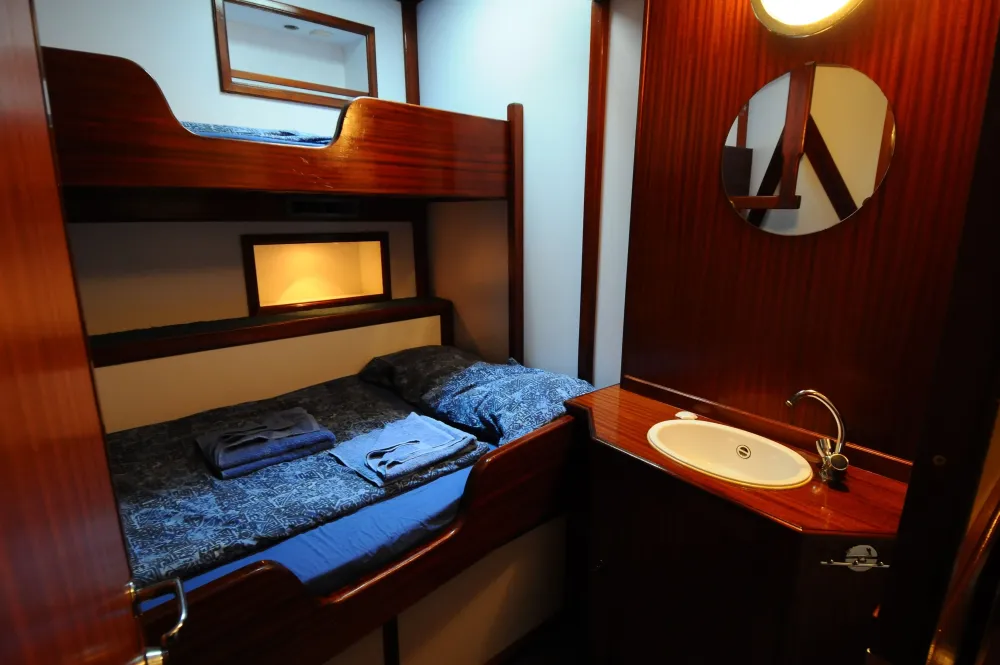 Cabin 2, Category A on Sea Pearl, porthole and timber panelling