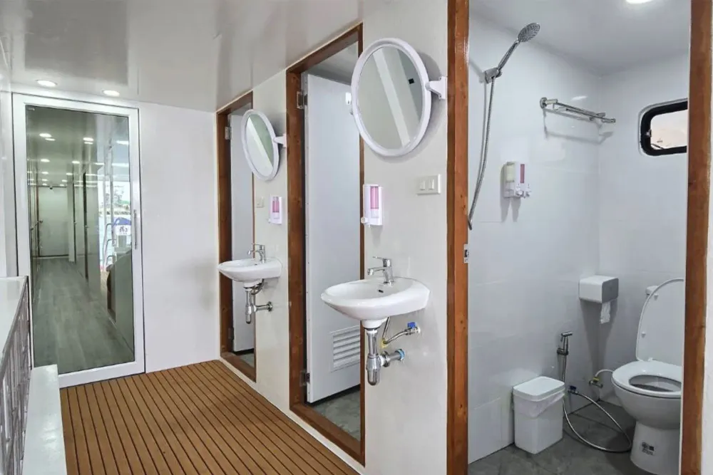 Shared showers and washbasins on Seatopia's upper deck