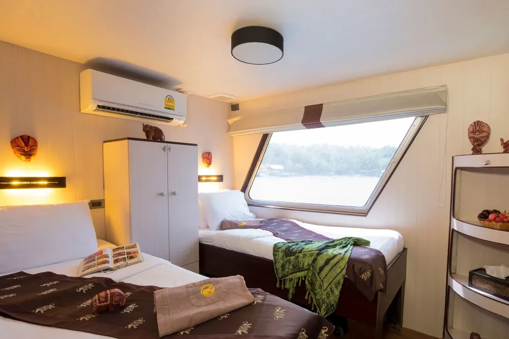 Deluxe cabin on Thailand Aggressor — two single beds and a picture window