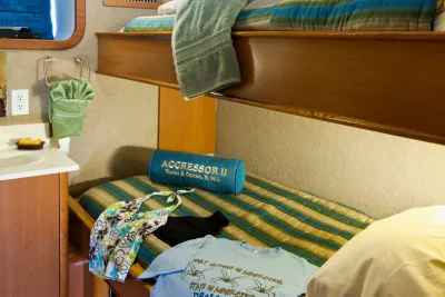 Deluxe stateroom on Turks and Caicos Aggressor II with the lower double berth and sink