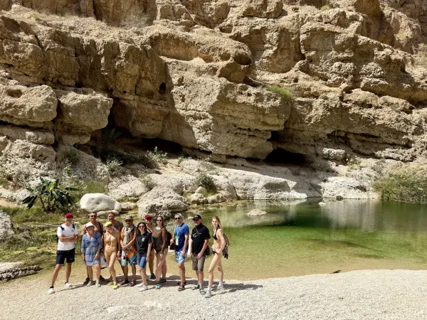 Group by the emerald pool in the canyon
