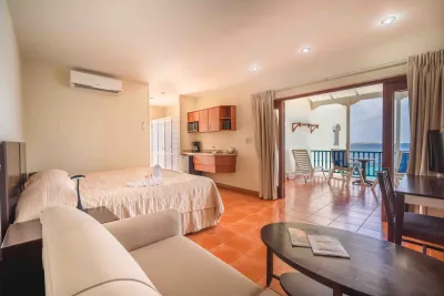 The suite bedroom with a work desk