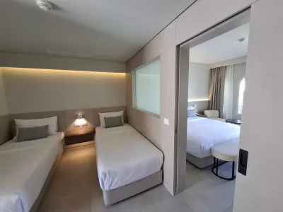 Deluxe Family Garden View Room — спальная зона