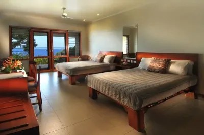 Deluxe Ocean View Room — две кровати и вид на океан