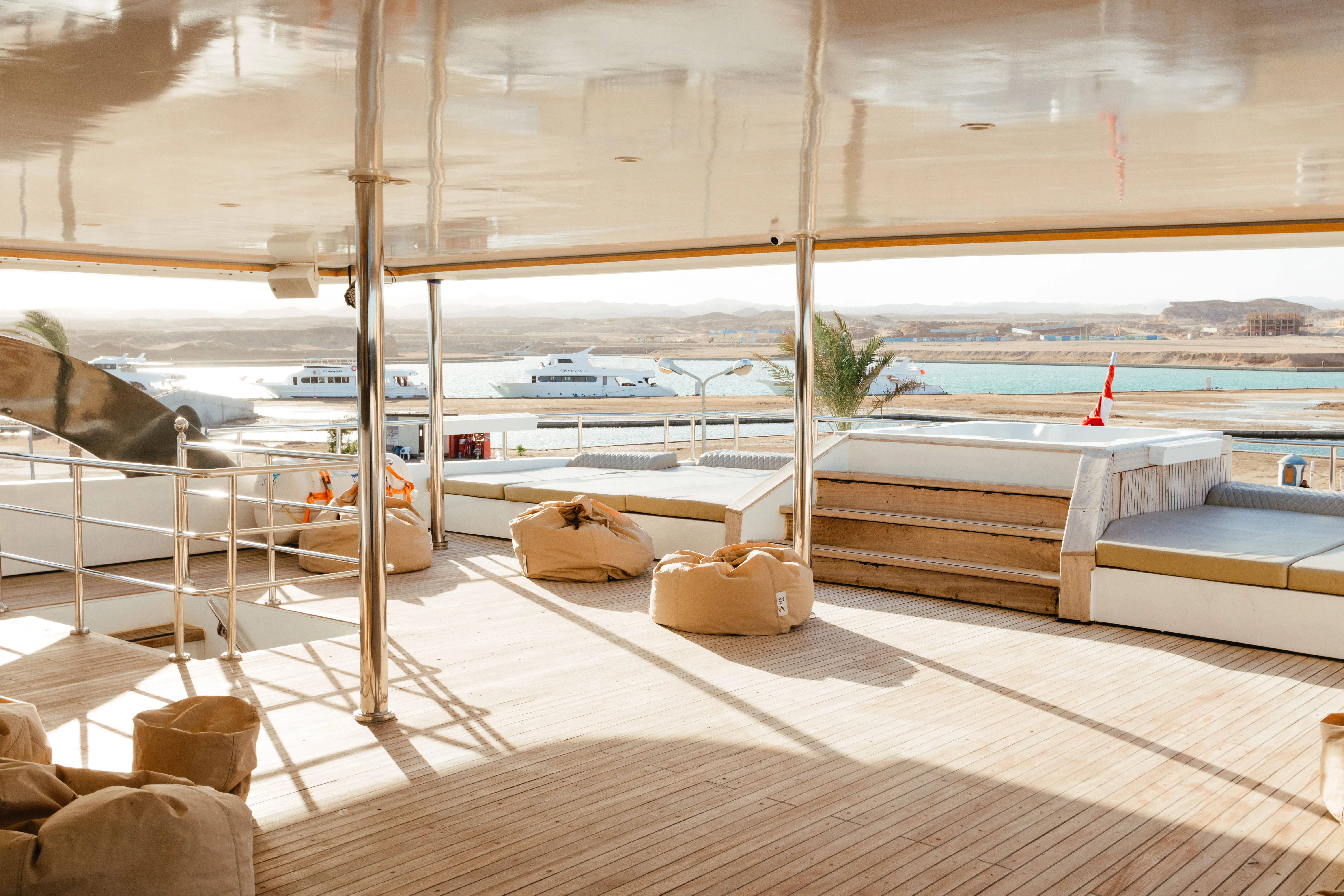 Avo's sun deck with the jacuzzi and lounging area