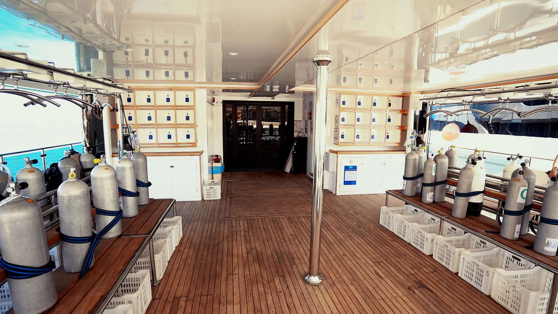 Avo's dive deck — tank racks and gear crates
