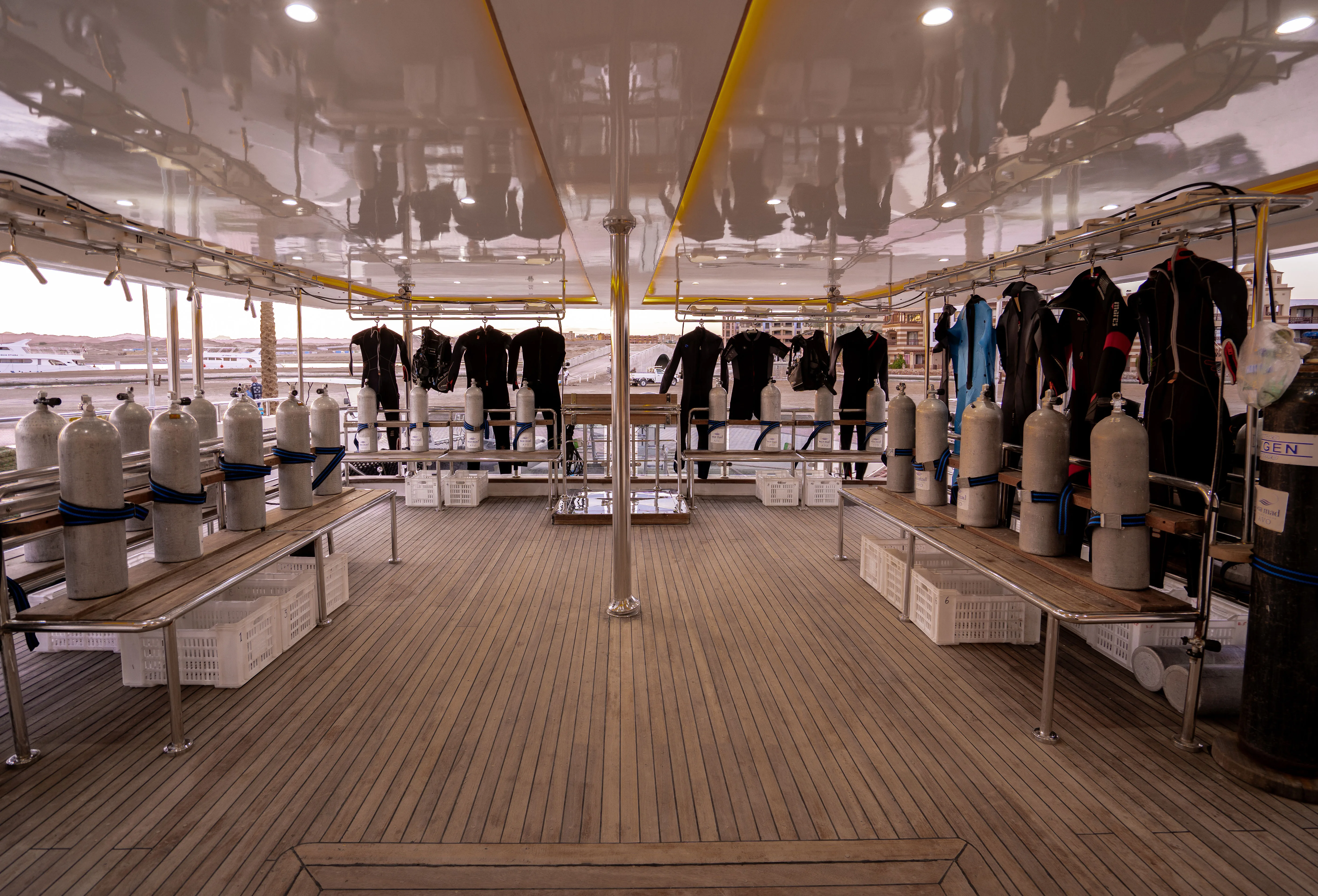 Wetsuits and BCDs on Avo's dive deck