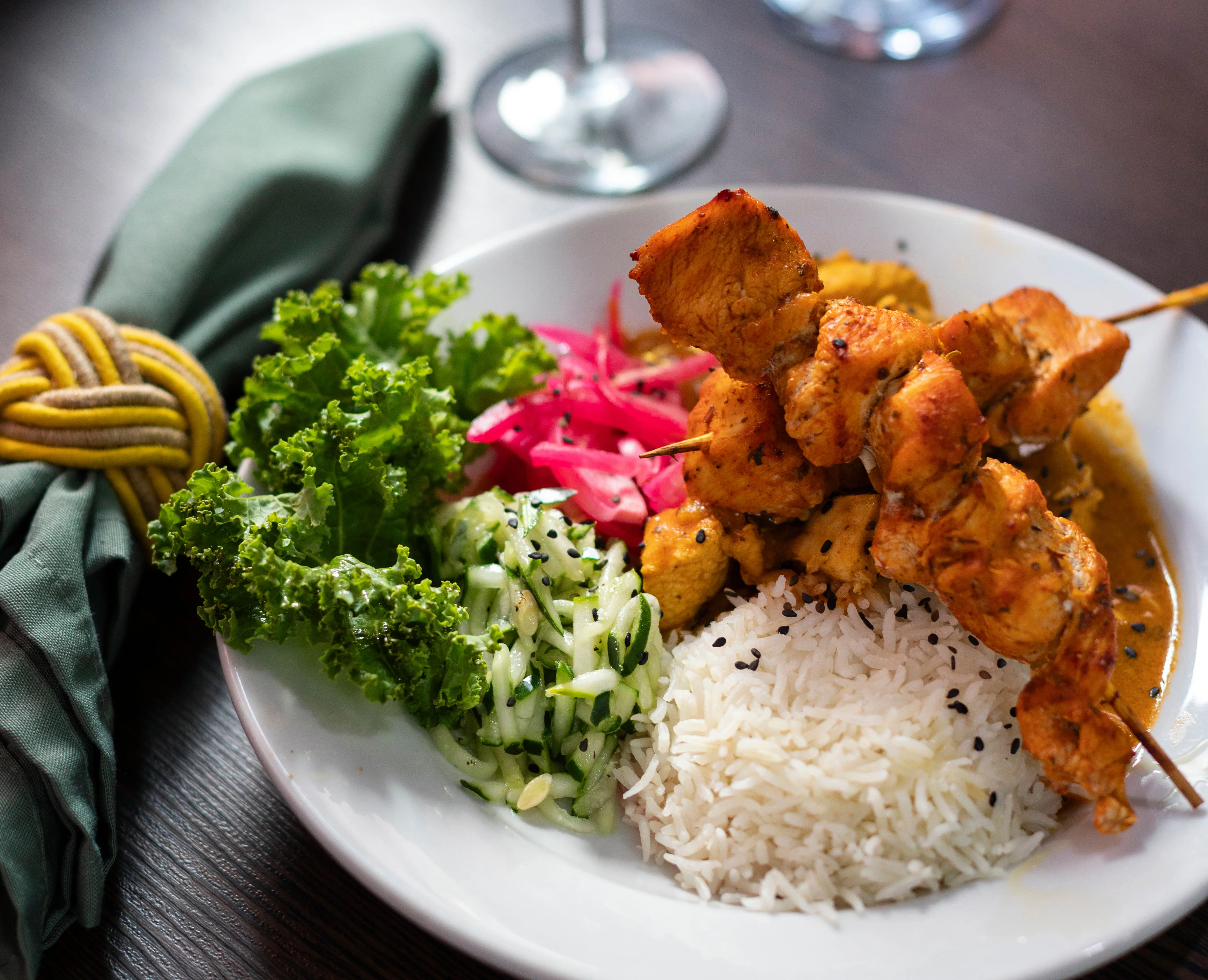 Dinner on board Belize Aggressor III — chicken skewers with rice