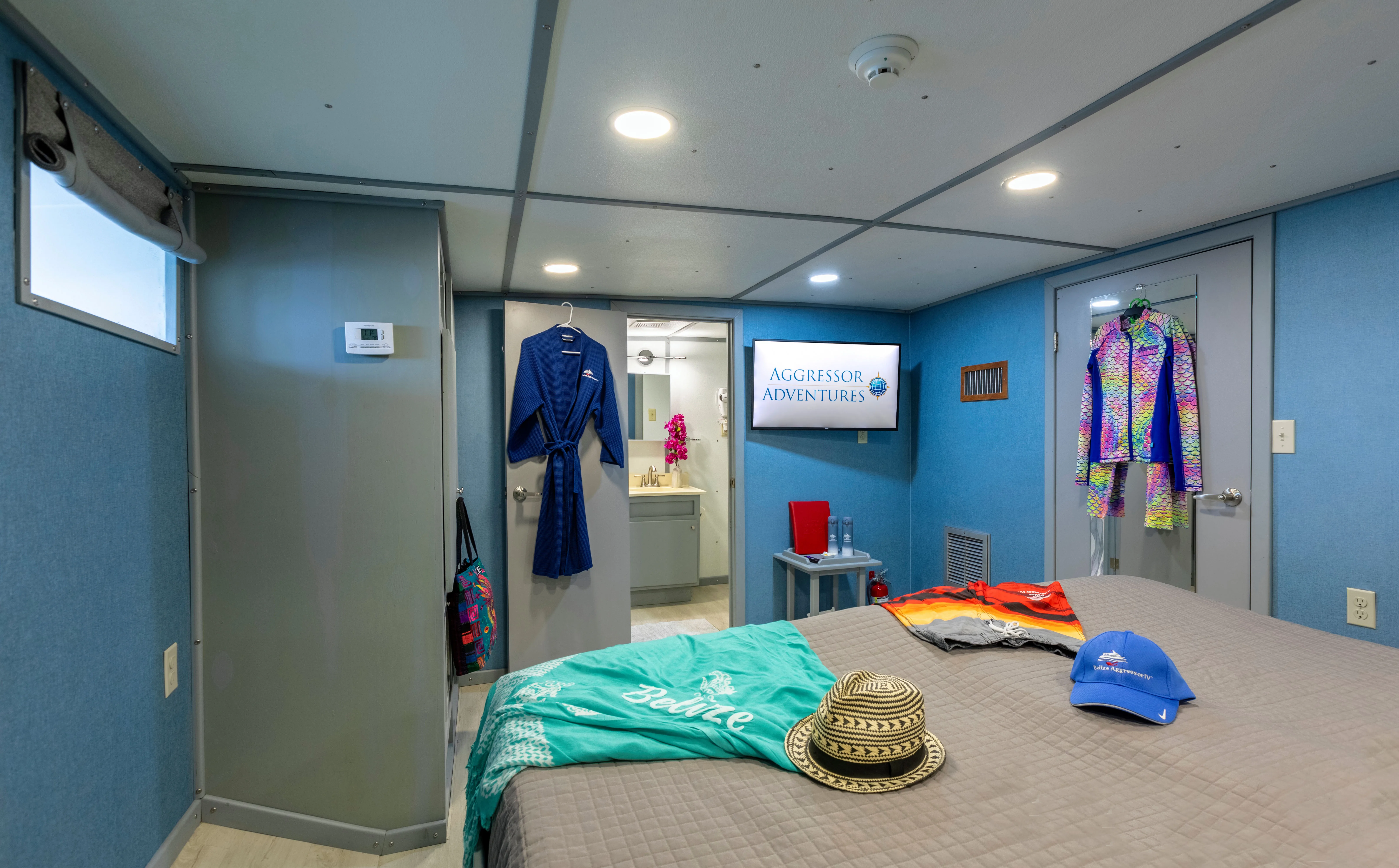 Master cabin on Belize Aggressor III — view towards the bathroom and closet