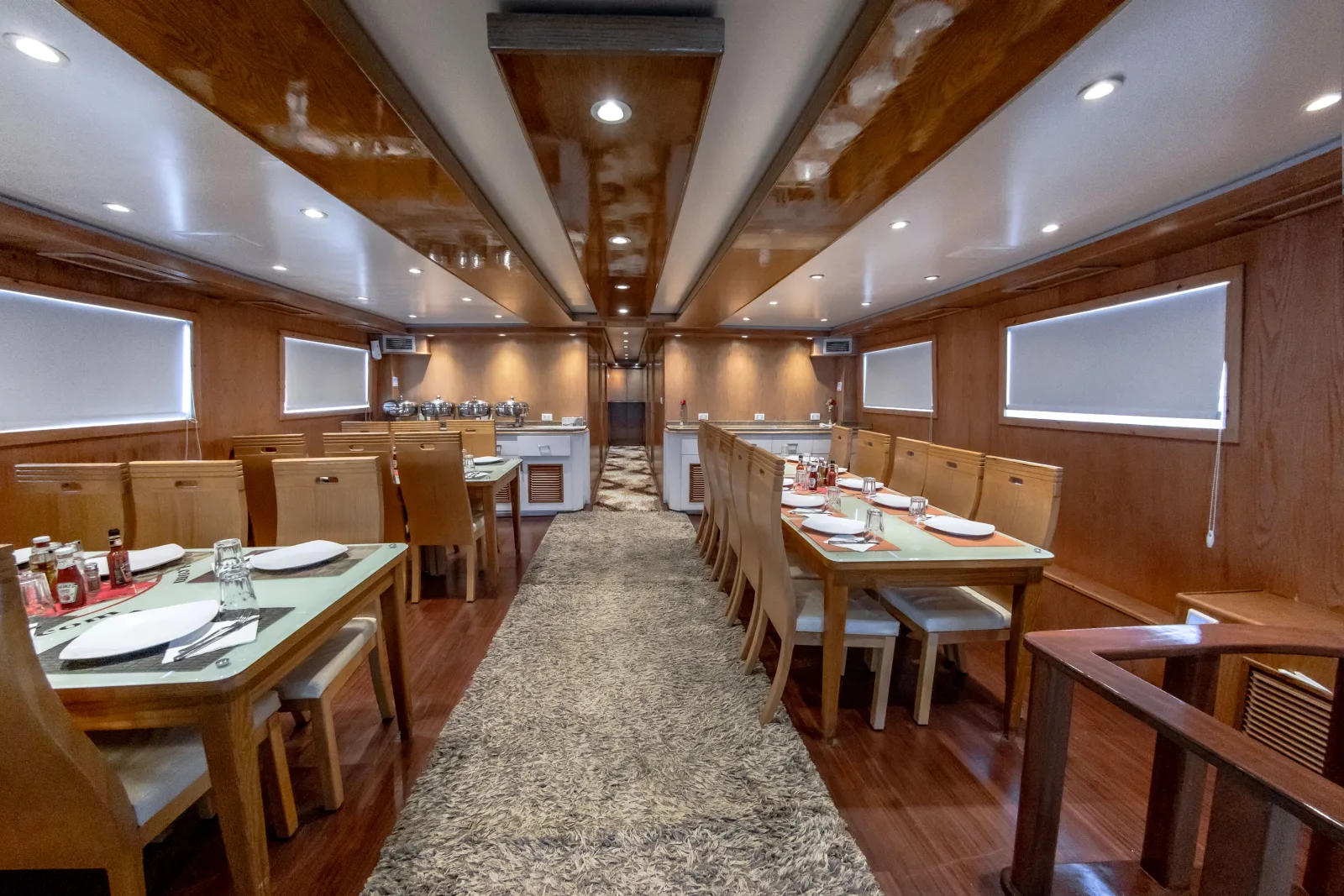 Bella 3 restaurant — tables laid for 20 guests