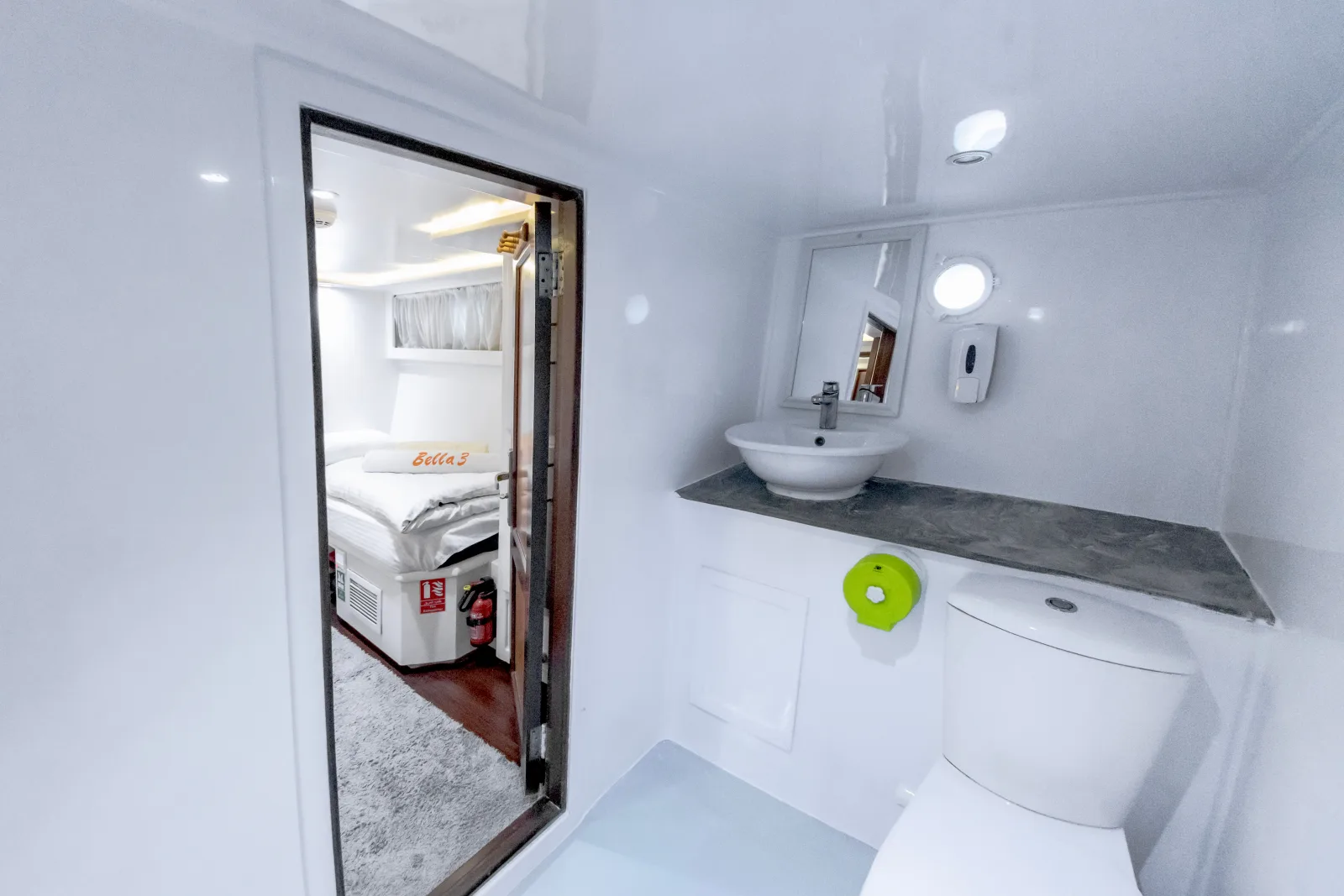 Bella 3 cabin bathroom — shower, basin and mirror