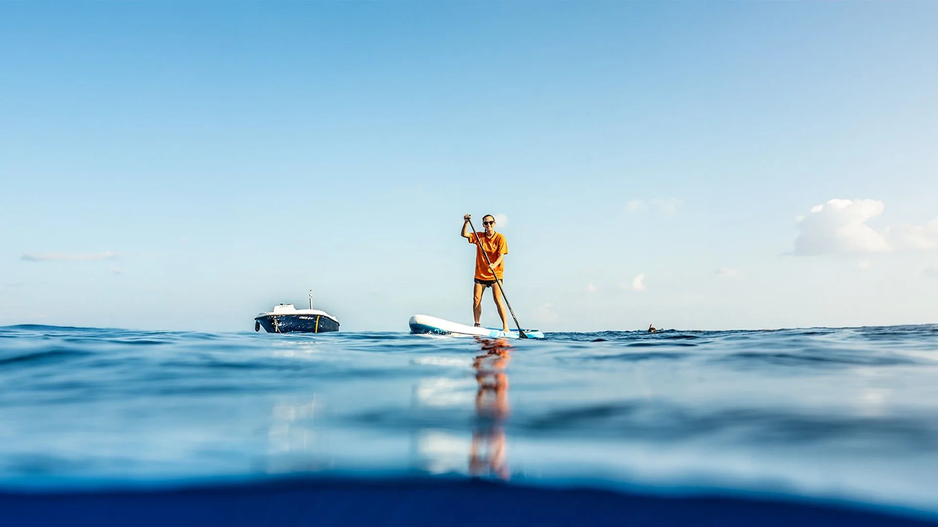 Paddleboarding beside Black Manta