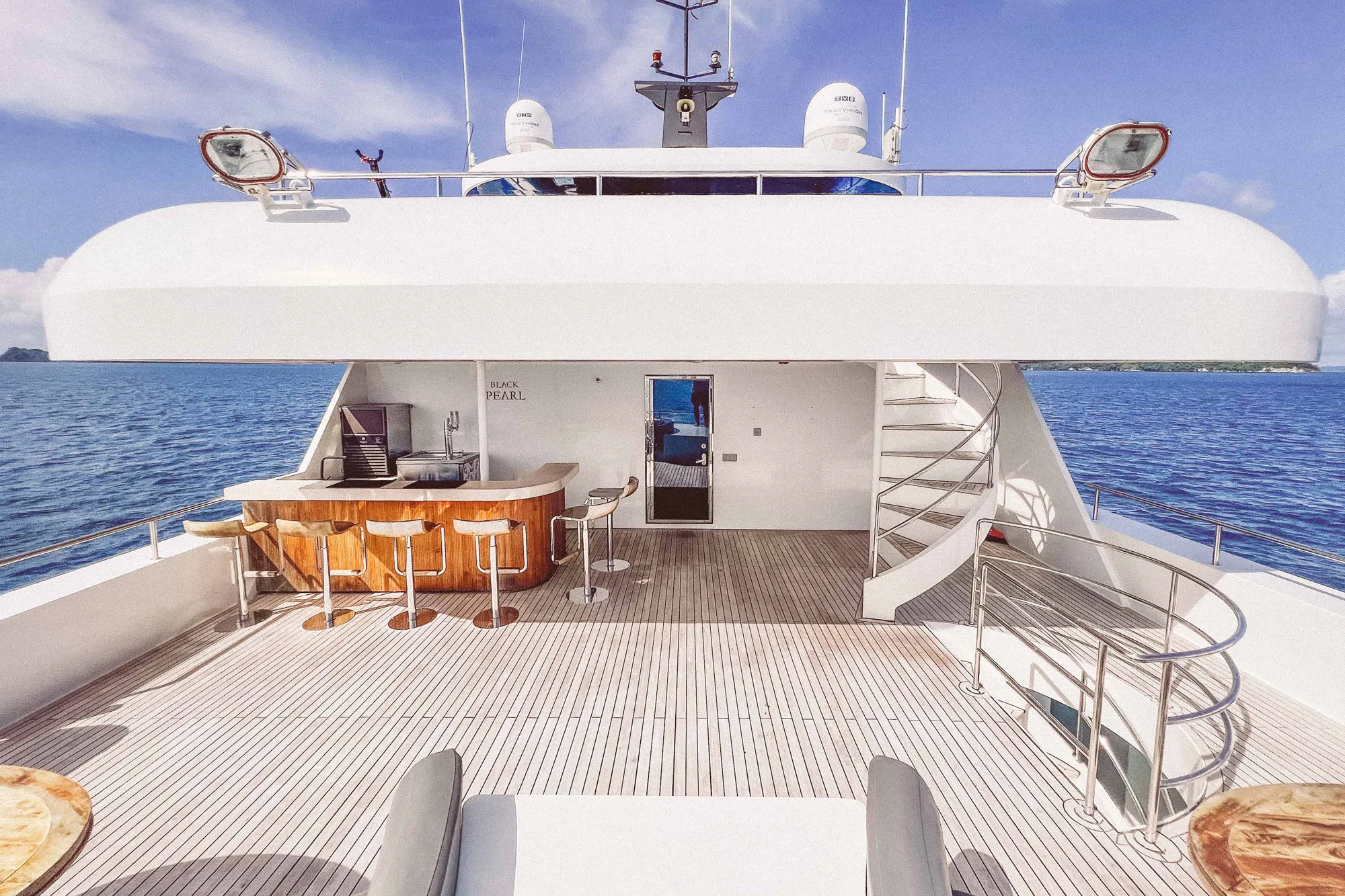 Aft deck of Black Pearl with the bar and stairs to the sun deck