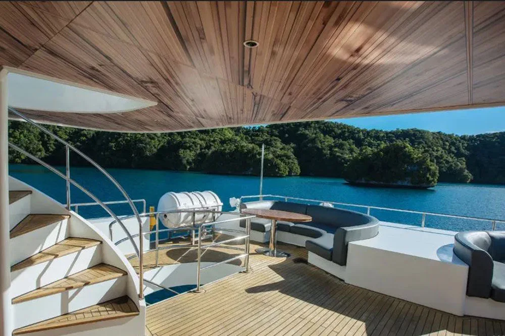 Open-air lounge on Black Pearl overlooking the cliffs of Palau