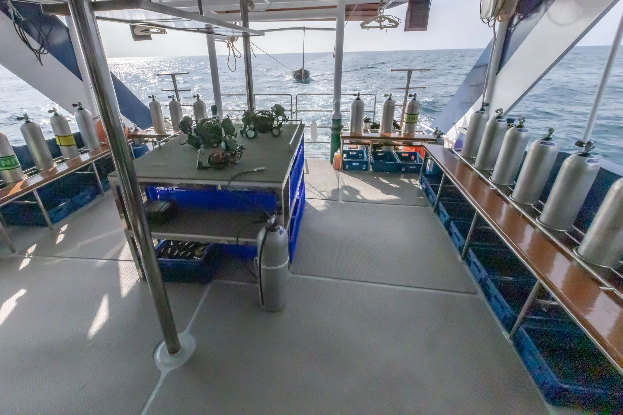 Dive deck of Blue Dolphin with tank racks and kitting-up stations