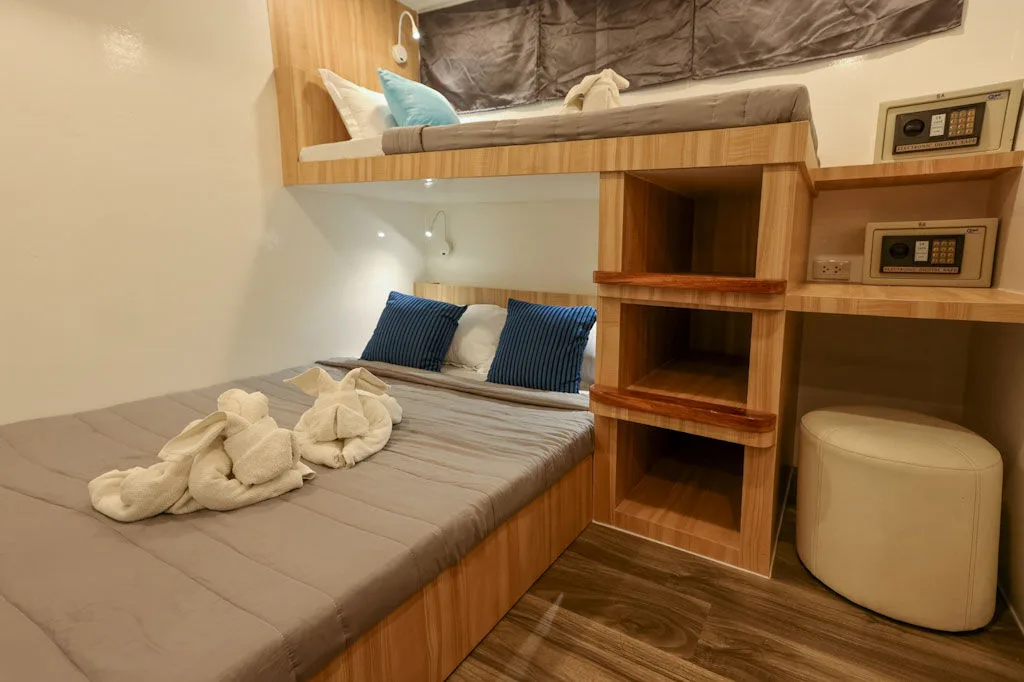 Main deck cabin set up with a double bed