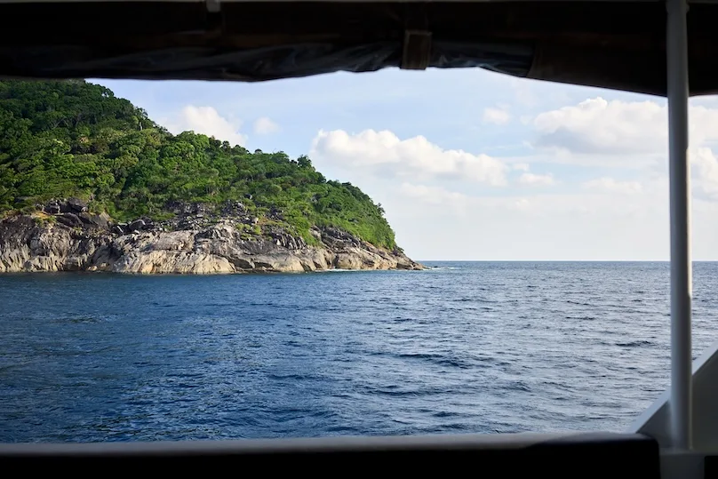 View from the deck of Blue Dolphin to the rocky shore of the Similan Islands
