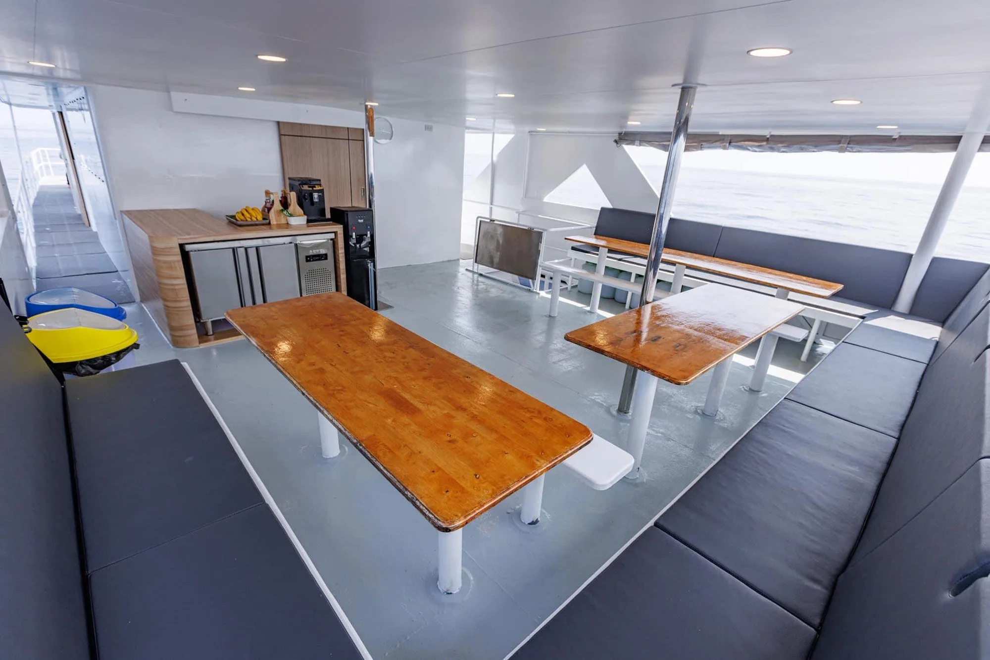 Outdoor dining area with wooden tables