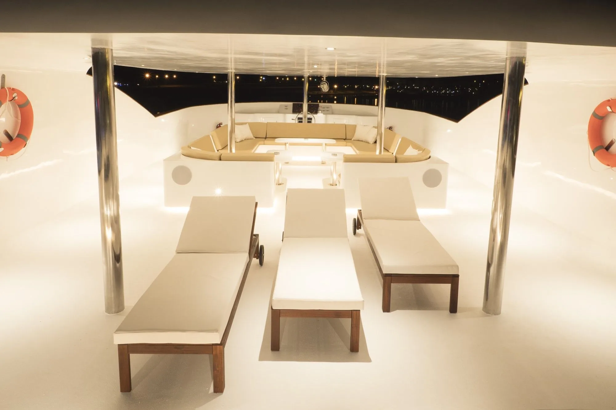 Loungers on the upper deck of Blue Force Three in the evening