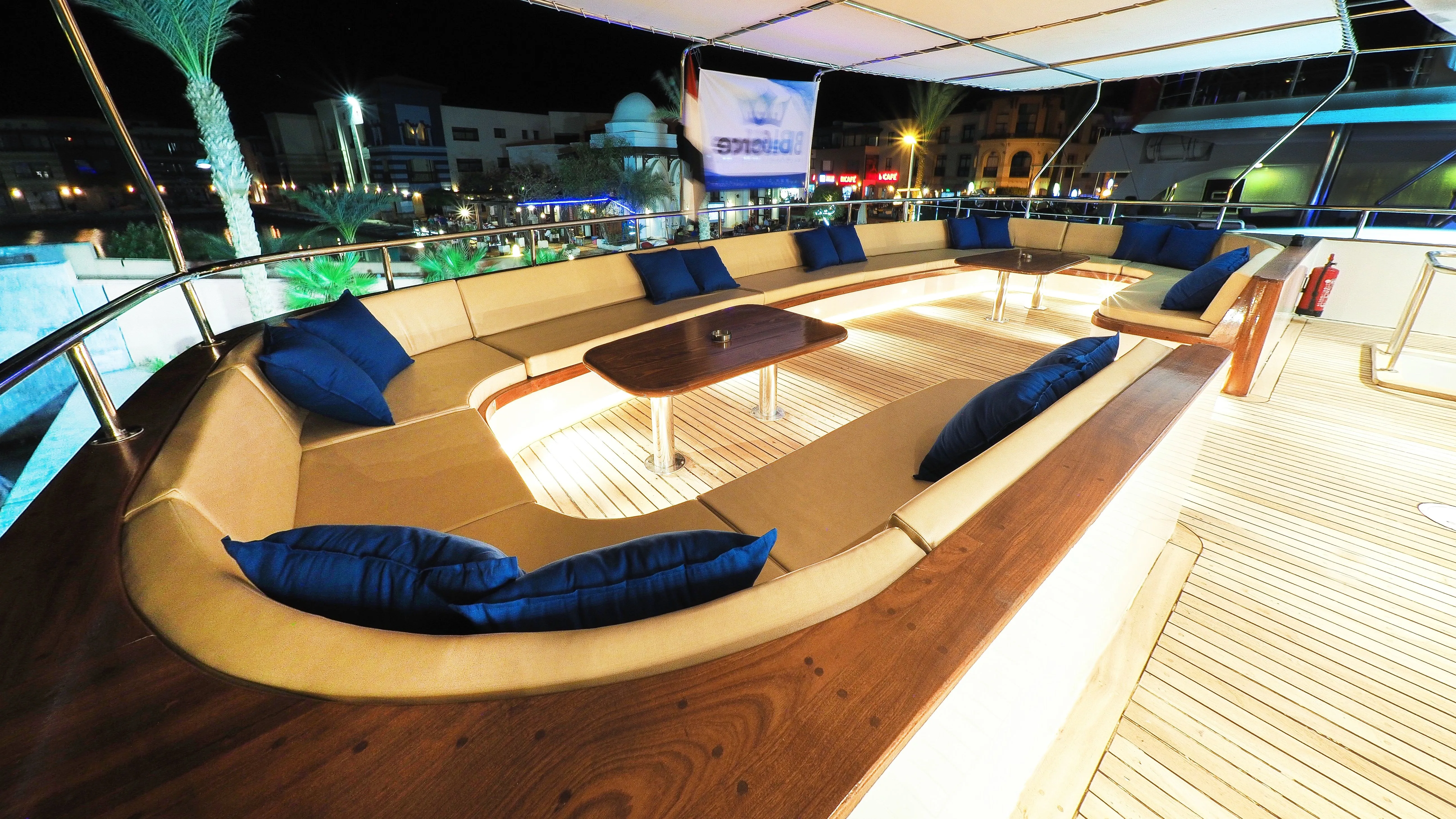 Outdoor sitting area on Blue Force Three with soft cushions