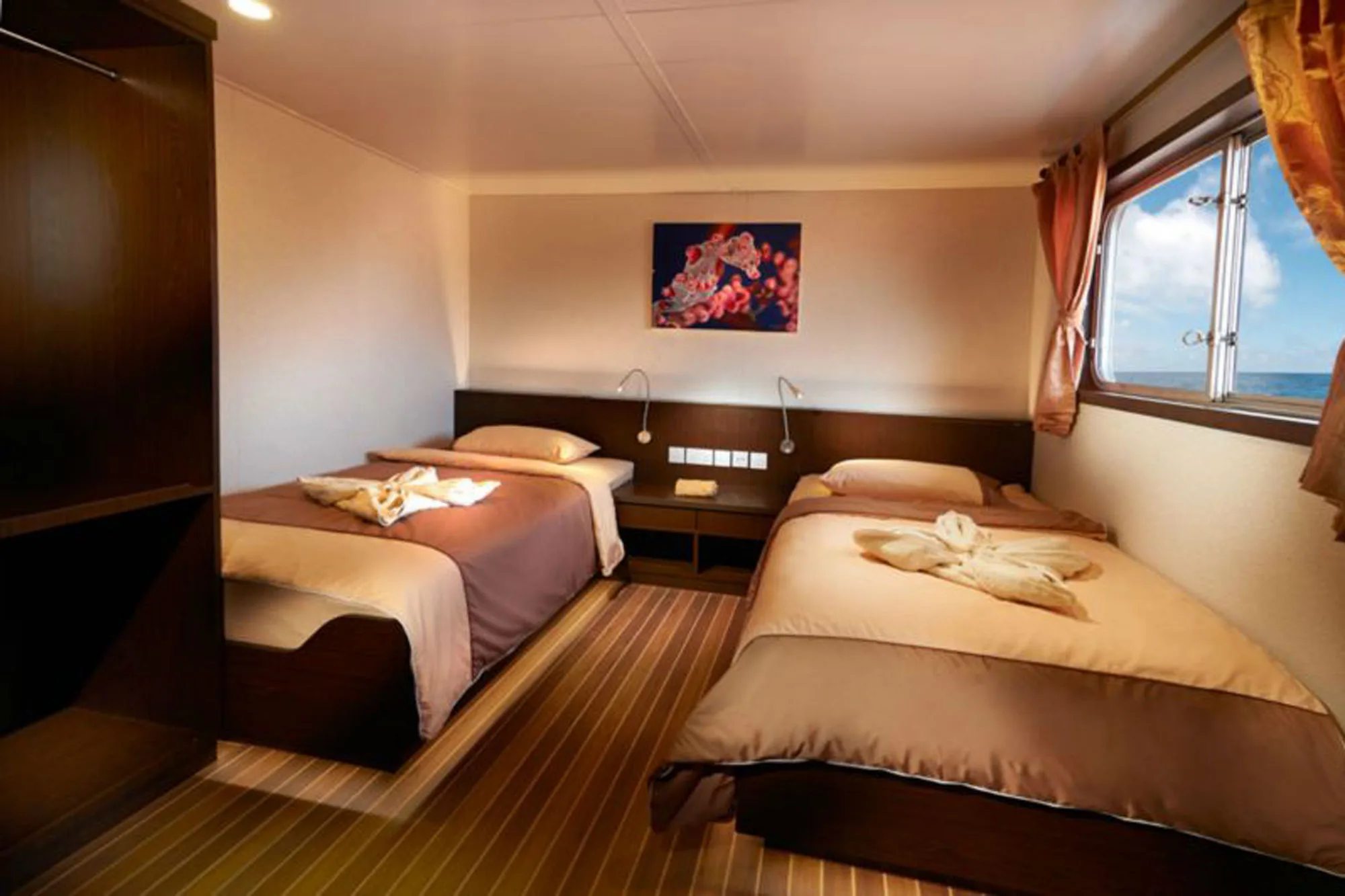Cabin C5 on the upper deck — two single beds and a window in the side