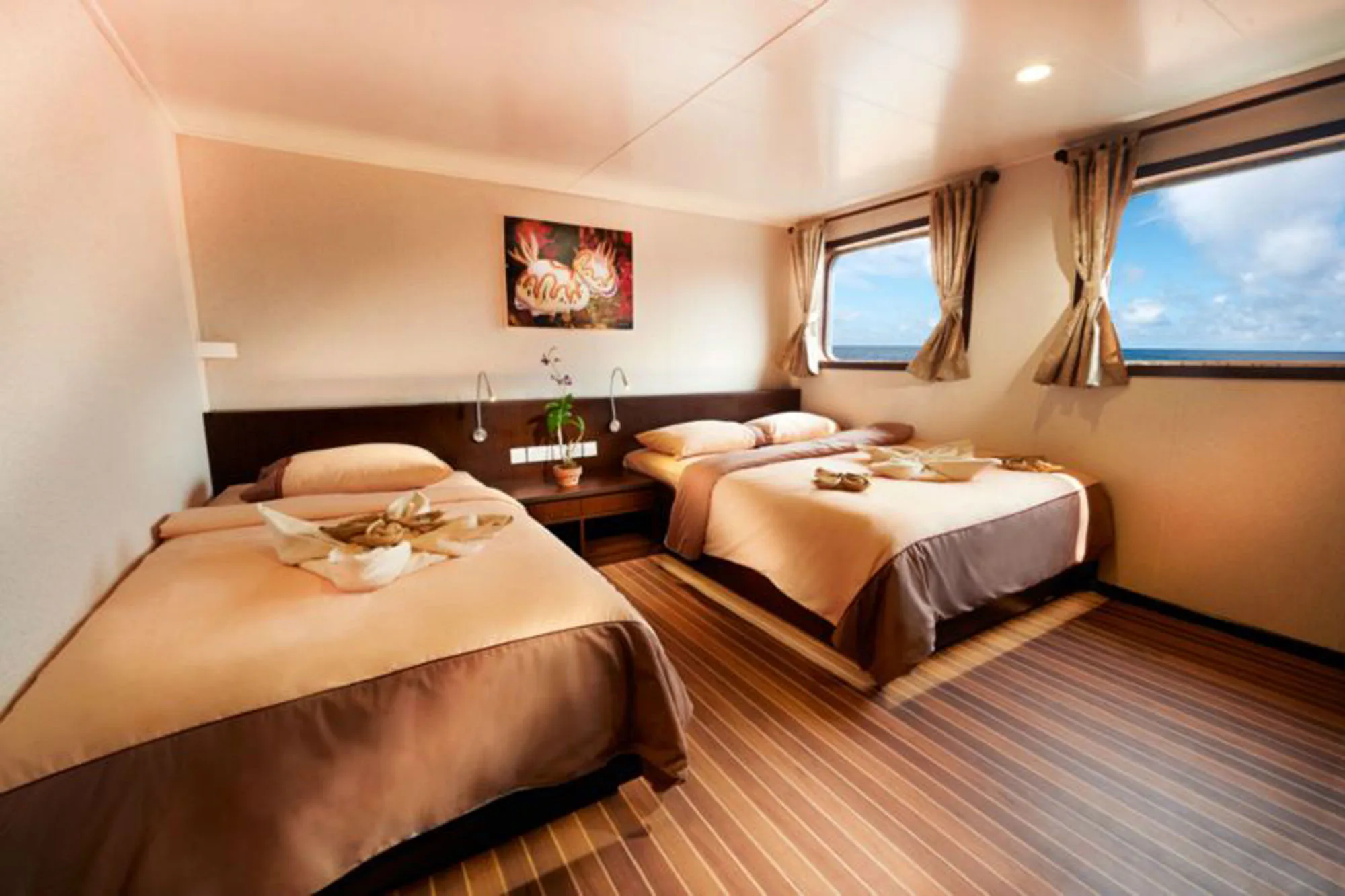 Cabin C6 — the same twin from another angle, bedside unit and reading lights
