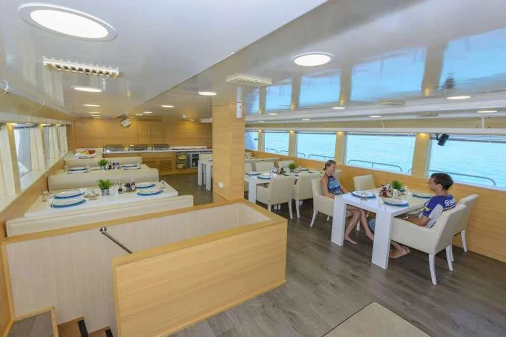 Dining area and banquette seating by the windows