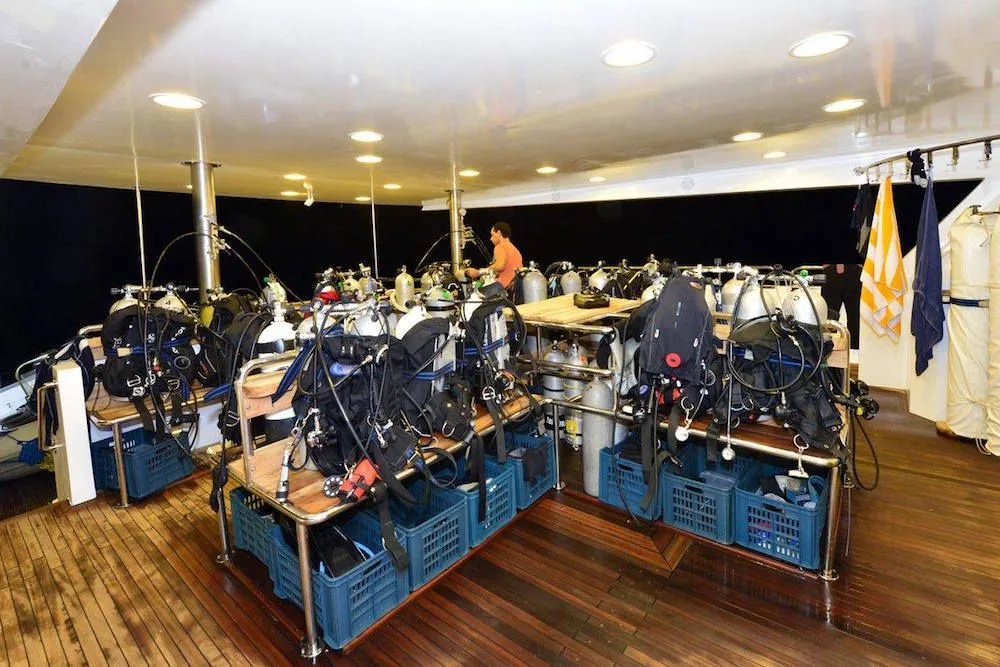 Dive deck with kitted-up gear and crates