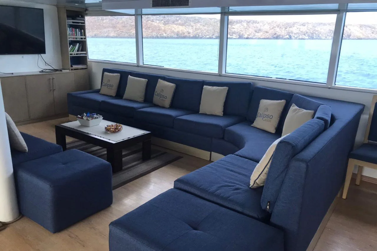 Calipso saloon with a corner sofa and panoramic windows
