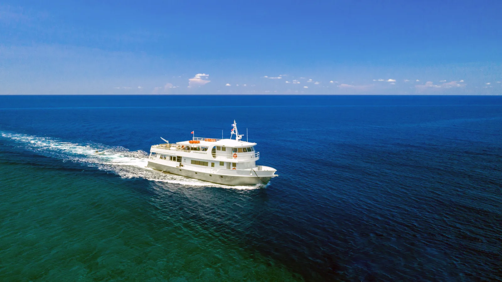 Cayman Aggressor IV seen from astern in open water