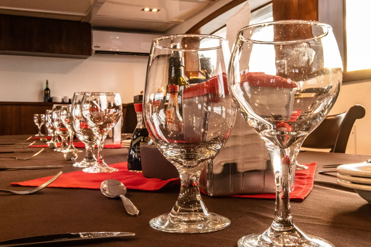 Table setting in the dining salon of Cocos Island Aggressor