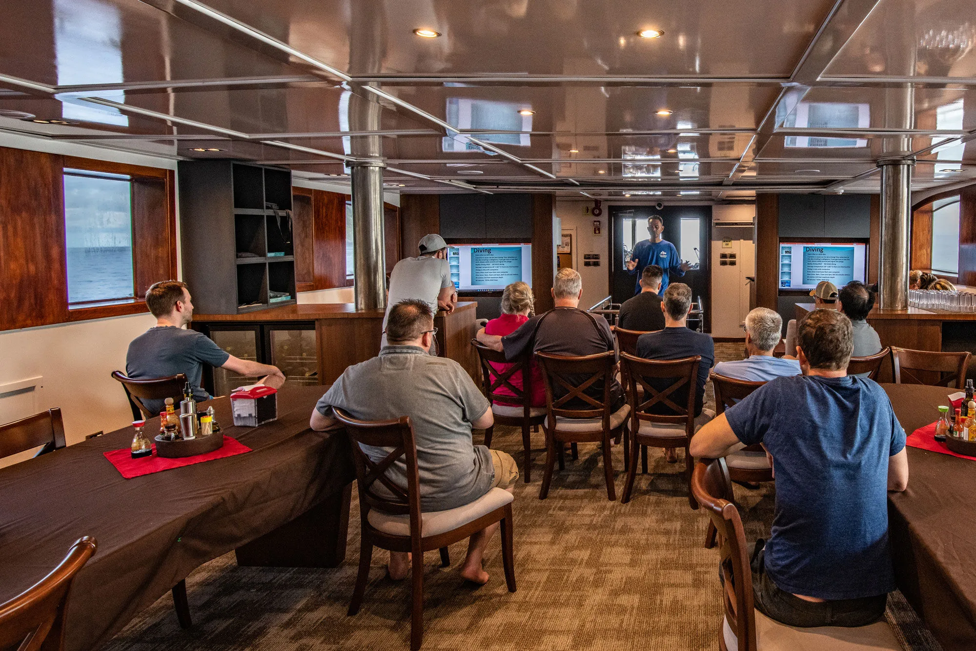 Pre-dive briefing in the salon of Cocos Island Aggressor