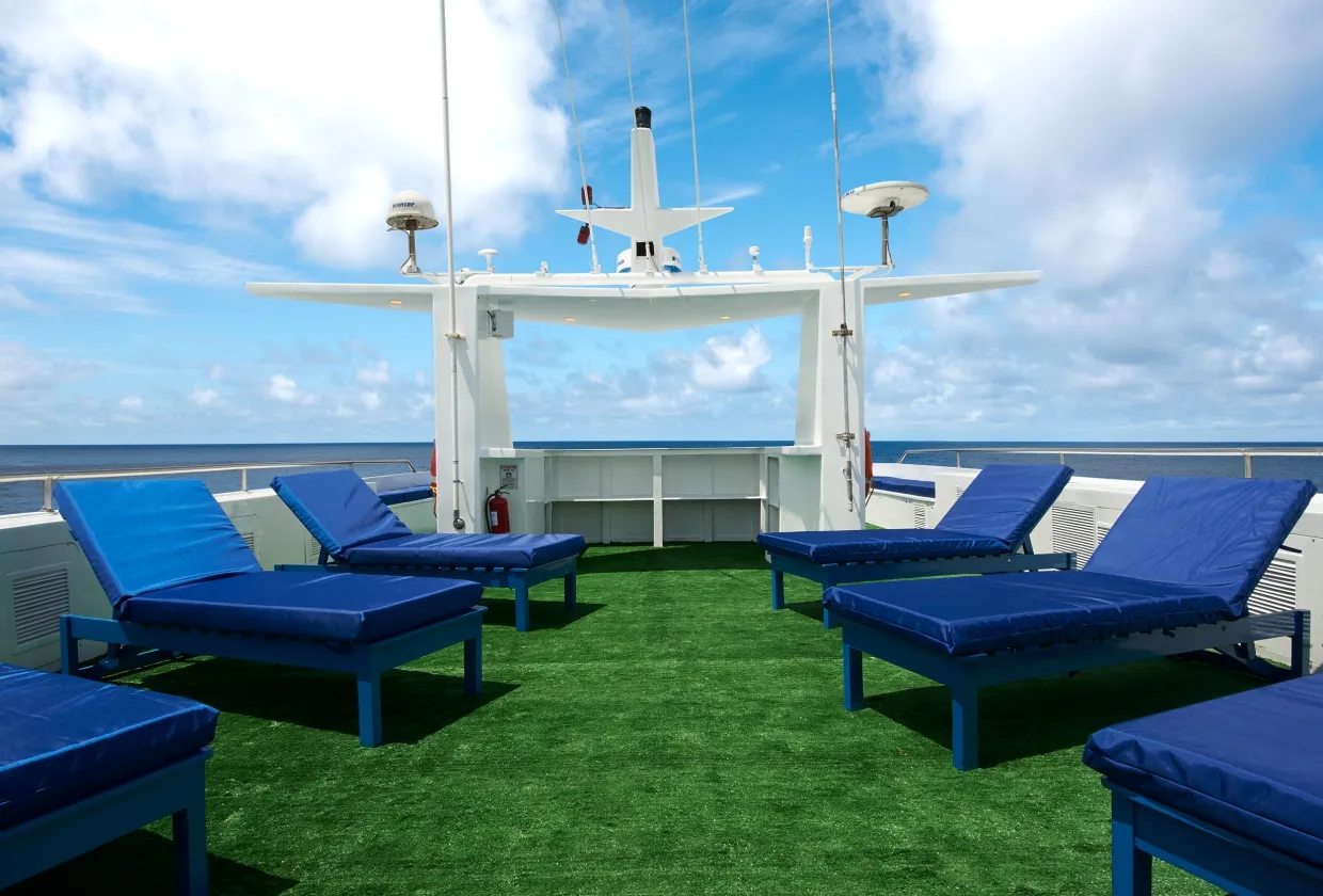 Loungers on the sun deck of Galapagos Master