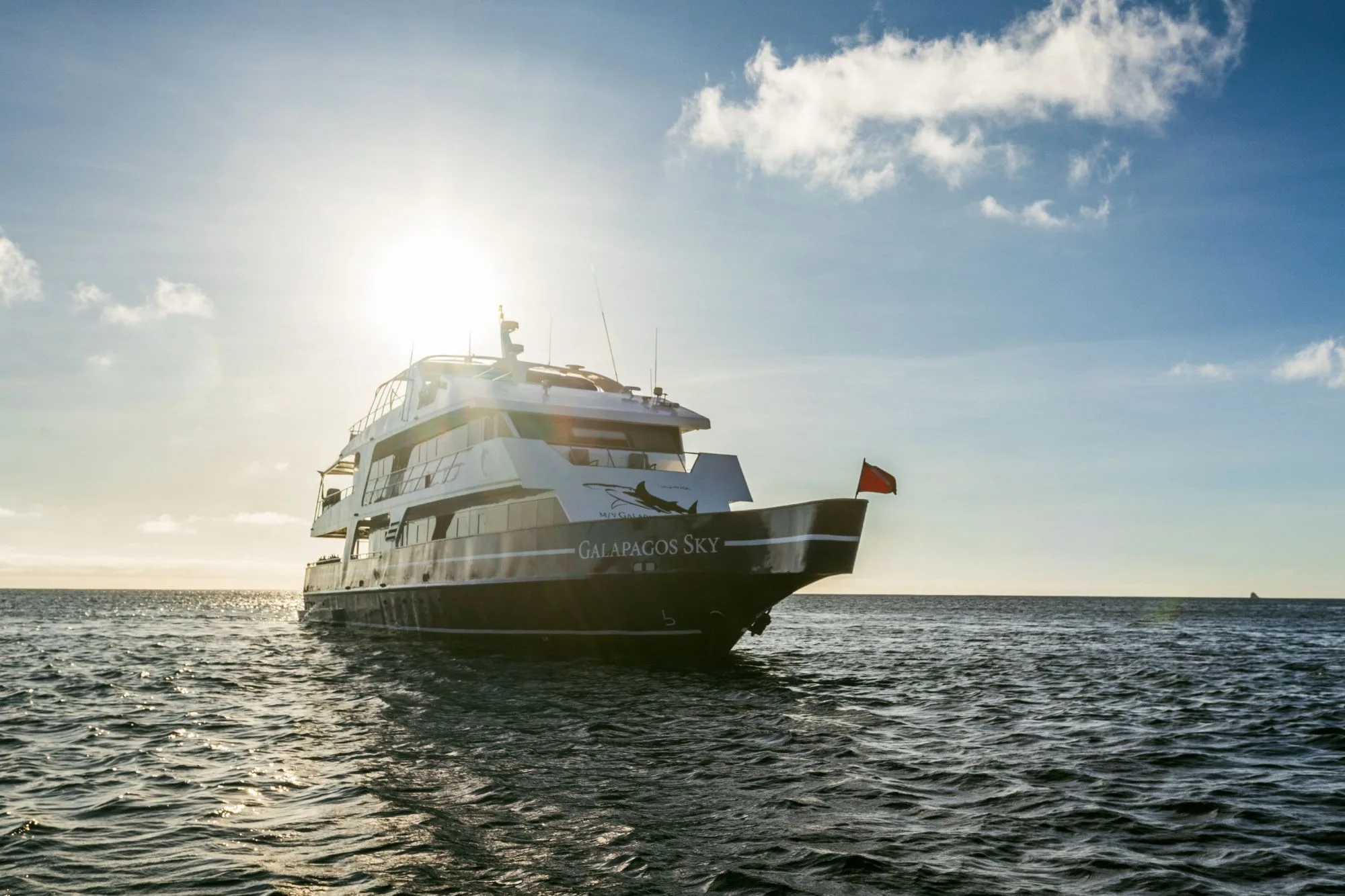Galapagos Sky at sunset, bow view