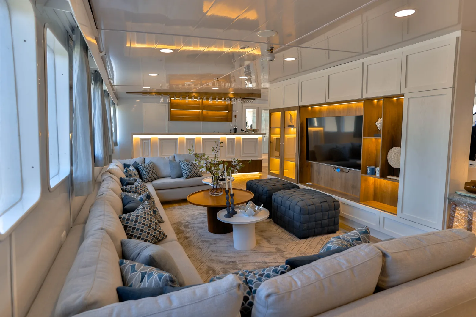 Lounge area of Galaxy Diver II with a television and accent lighting