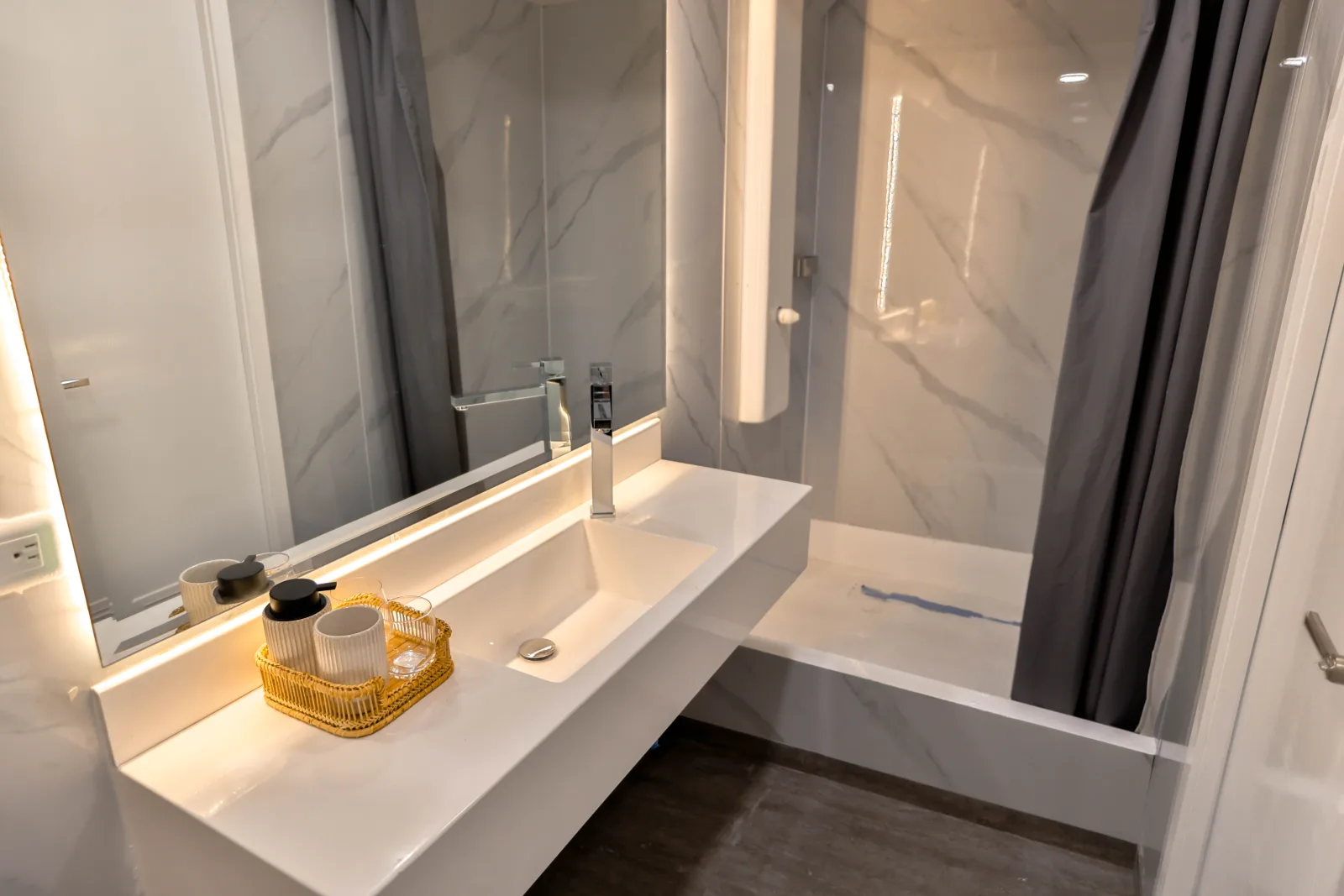 Cabin bathroom on Galaxy Diver II with marble finish and shower